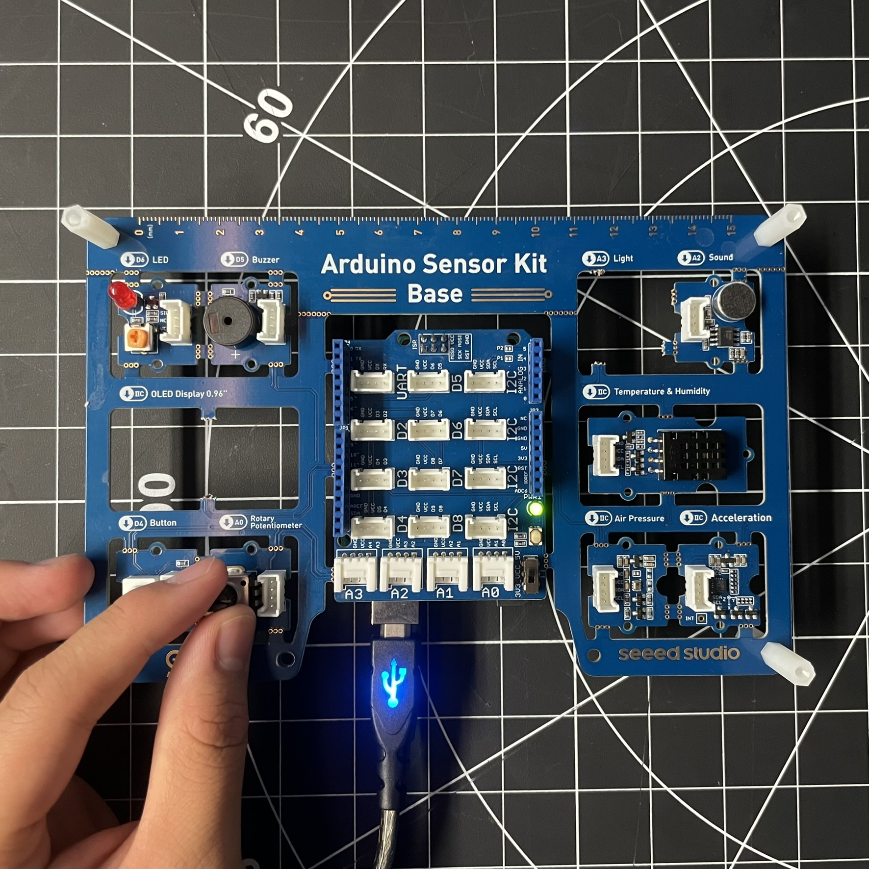 This is just an image of the Arduino Sensor Kit that we would be using to test certain apps and digital creations to combine with the board. Here I'm turning the dial on the kit, which is changing the data that it is providing, I also used the temperature sensor on the right to change the temperature.